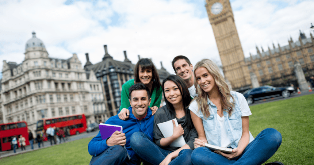 A group of students smiling to represent UK Universities for International Students
