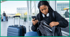 A student sitting at the airport for Lost passport while studying abroad